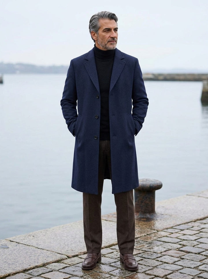 Halden overcoat in Navy, lifestyle on a stone harbor quay, Gentlemens Manor