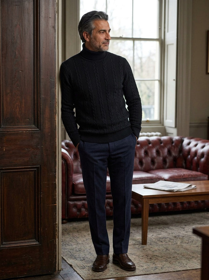 Halsey sweater in Black, lifestyle in a club reading room, Gentlemens Manor