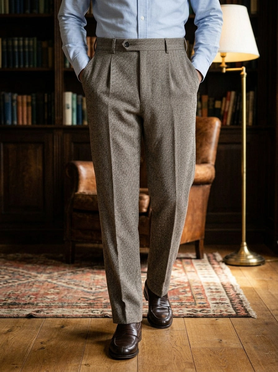 Harcourt herringbone pleated trousers in Brown, lifestyle in a private study, Gentlemens Manor