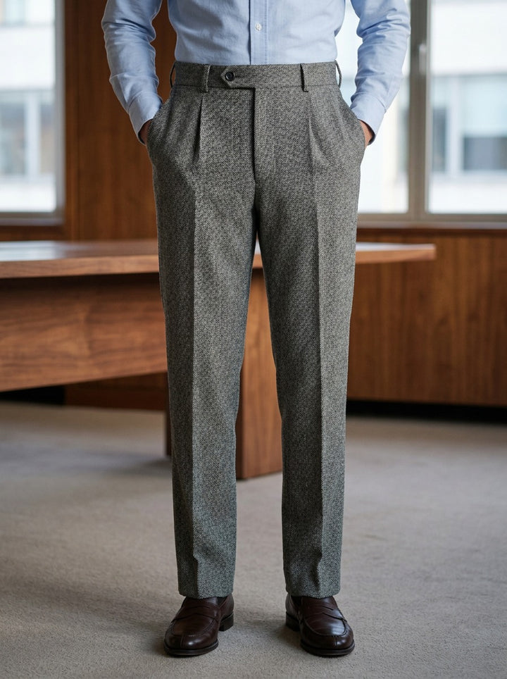 Harcourt herringbone pleated trousers in Grey, lifestyle in a timber paneled office, Gentlemens Manor