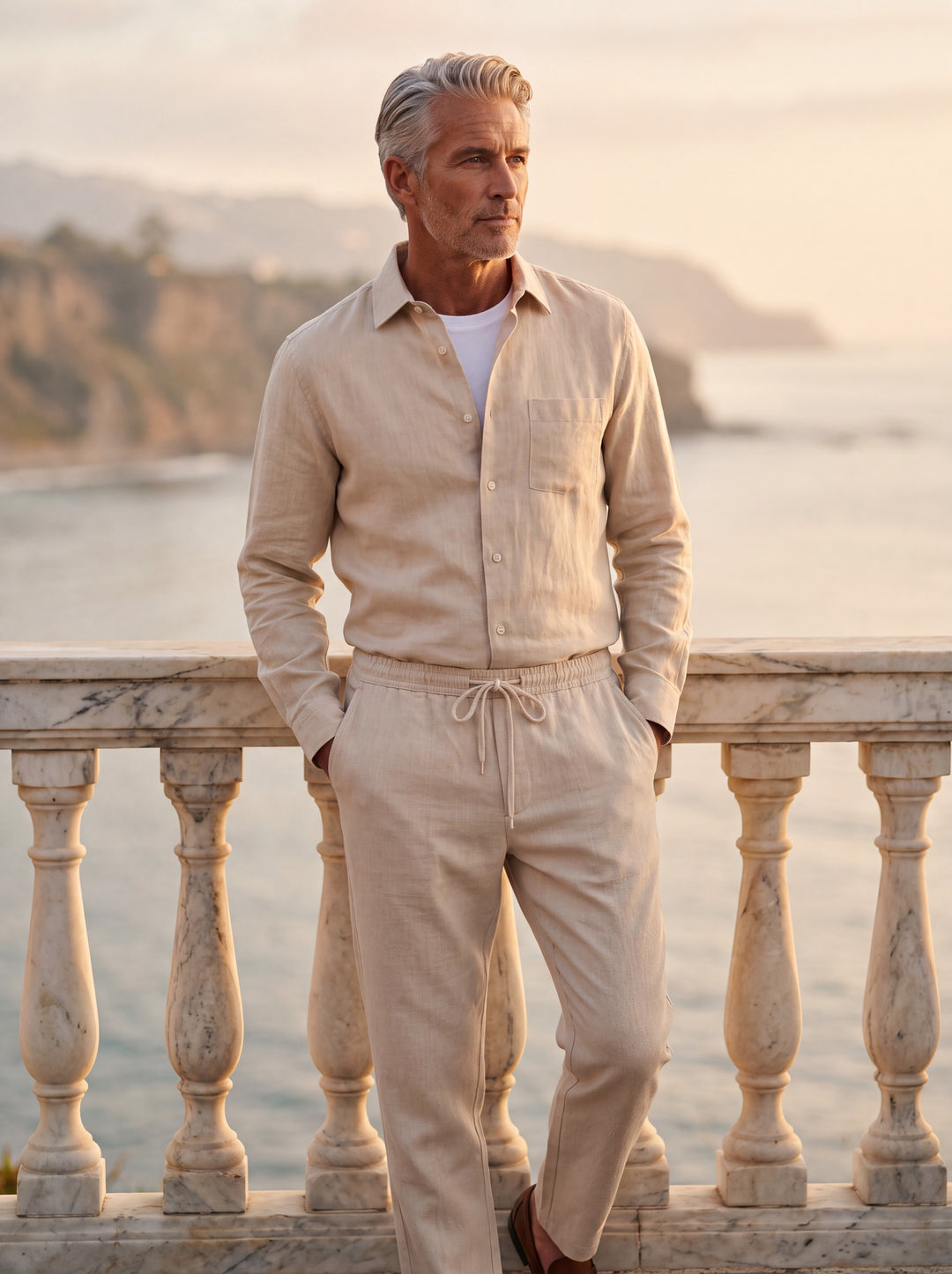 Hardy Men two piece set in Sand, worn by a model on a Mediterranean terrace - Gentlemens Manor lifestyle