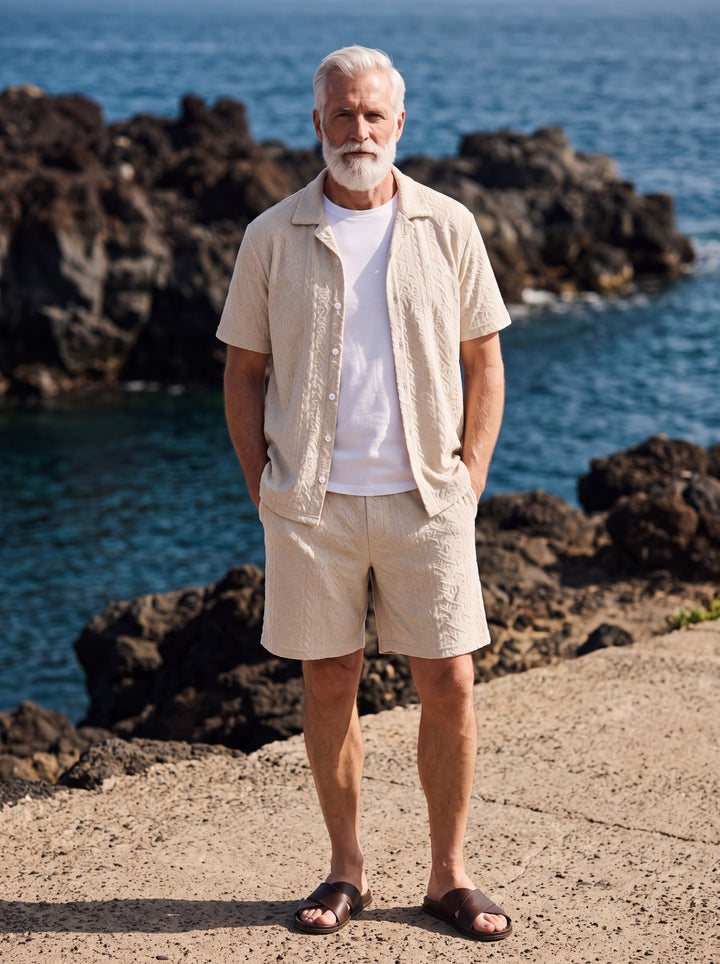 Harley Men two-piece summer set in sand, worn by a model in a Mediterranean setting - Gentlemens Manor lifestyle