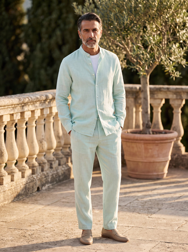 Harold Men two piece set in Green, worn by a model on a Mediterranean terrace - Gentlemens Manor lifestyle