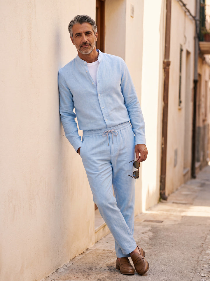 Harold Men two piece set in Light Blue, worn by a model on a Mediterranean terrace - Gentlemens Manor lifestyle