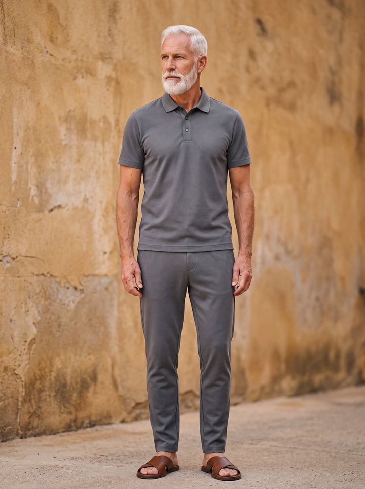 Harper Men two-piece summer set in grey, worn by a model in a Mediterranean setting - Gentlemens Manor lifestyle