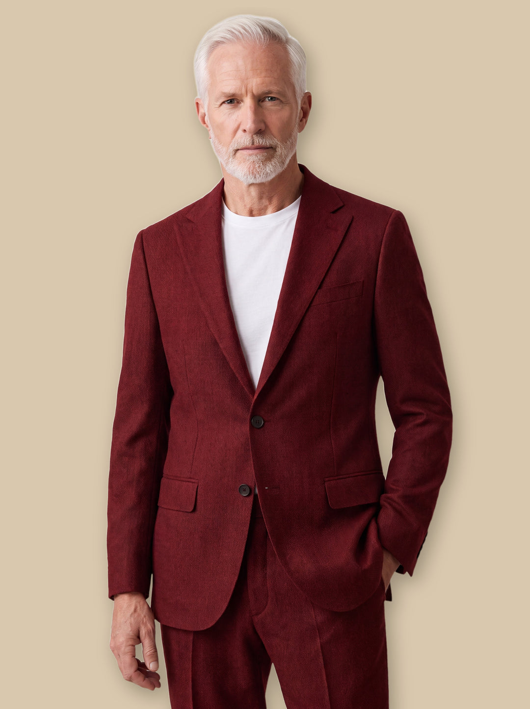 Harrison blazer suit in Red, worn by a model on a warm sand studio background - Gentlemens Manor