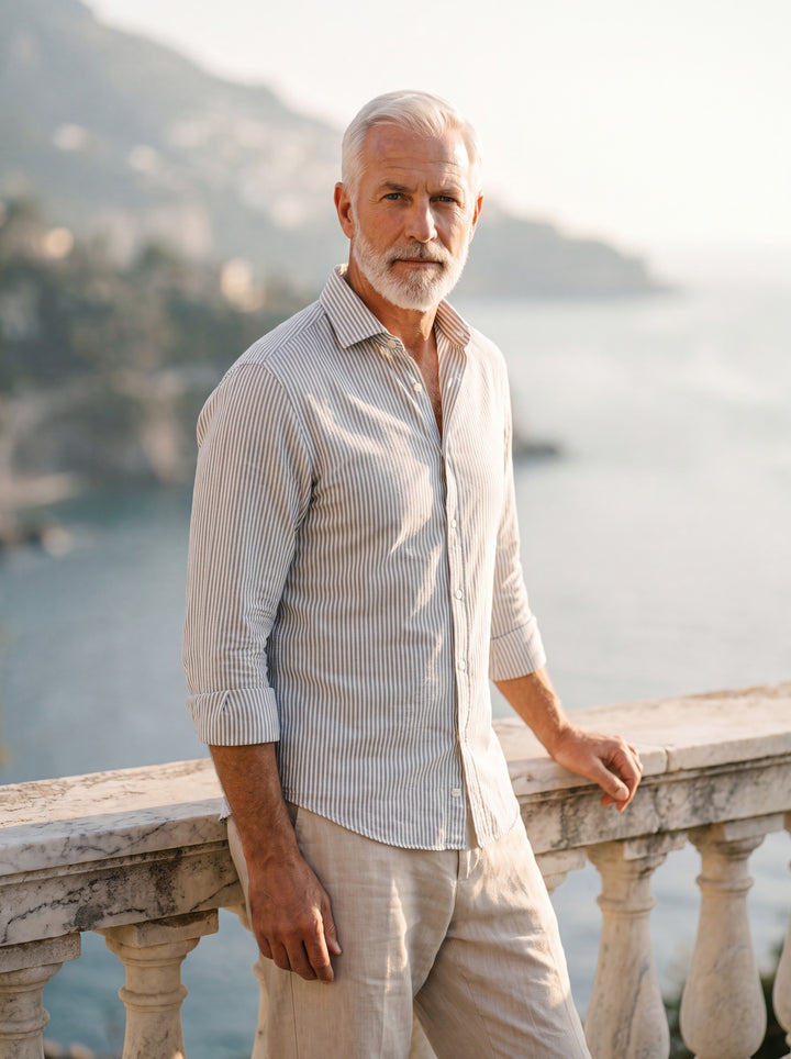 Hayes Men dress shirt in Light Blue, worn by a model on a Mediterranean terrace - Gentlemens Manor lifestyle