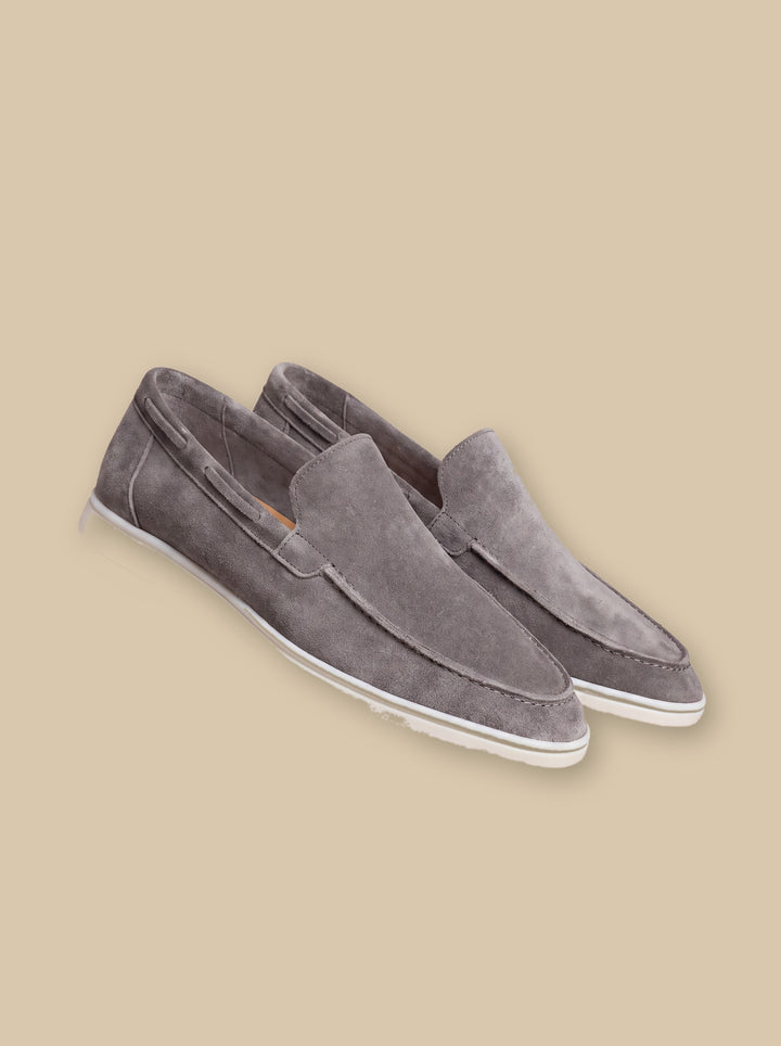 Heath loafers in Grey, on a warm sand studio background - Gentlemens Manor