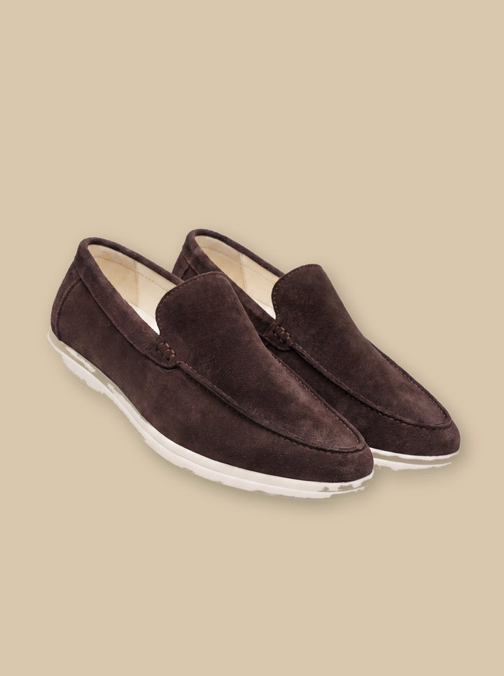 Henry loafers in Brown, on a warm sand studio background - Gentlemens Manor