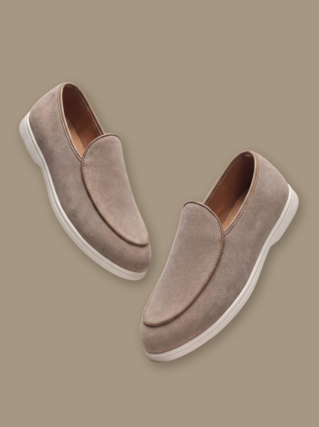 Herbert loafers in Beige, on a warm taupe studio background - Gentlemens Manor