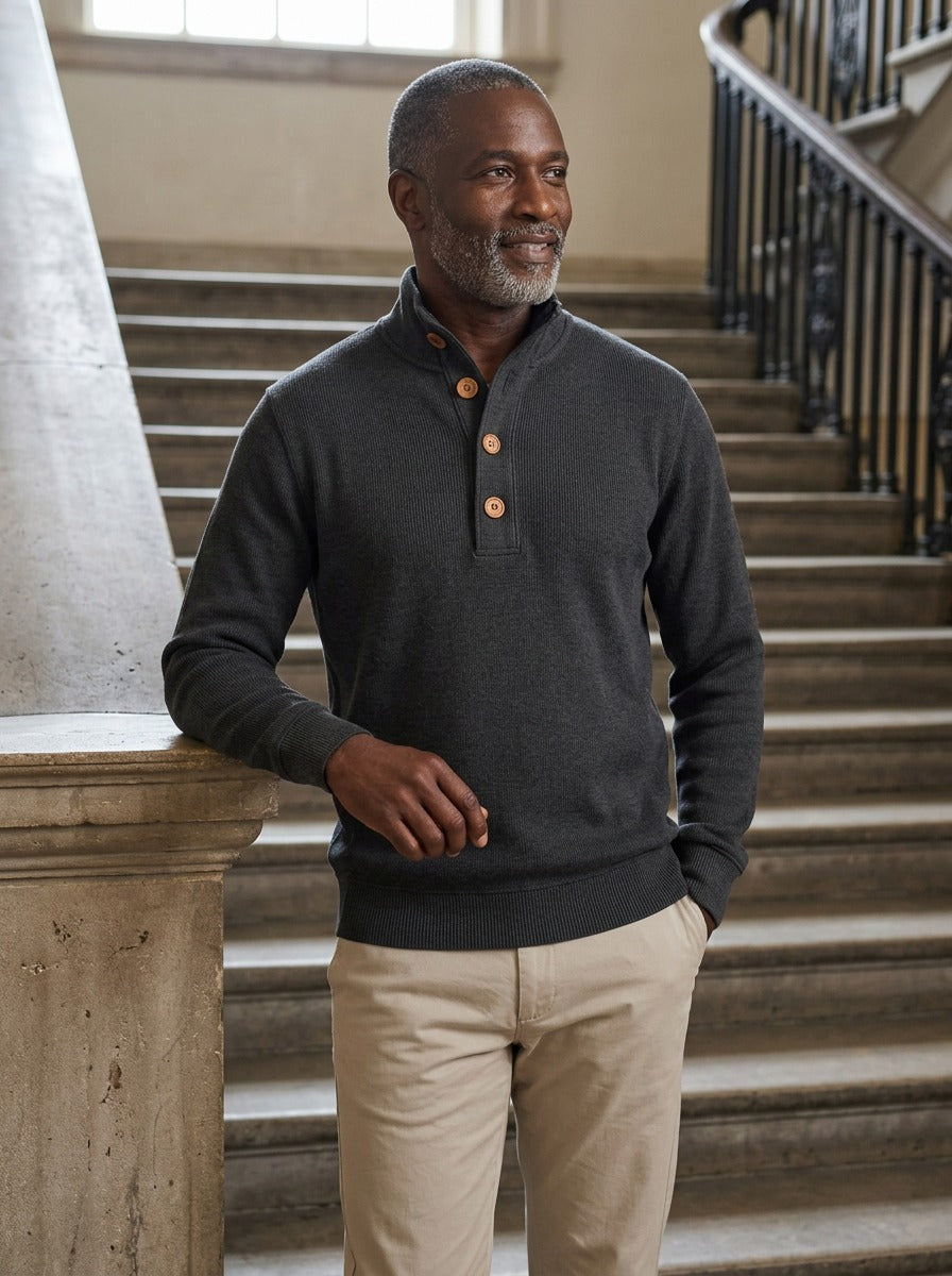 Holcomb sweater in Charcoal, lifestyle on a civic stone staircase, Gentlemens Manor