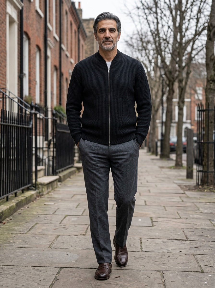 Hopkins ribbed zip cardigan in Black, lifestyle on a street of brick row houses, Gentlemens Manor