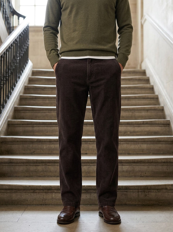 Howell wide wale corduroy pants in Brown, lifestyle on a civic stone staircase, Gentlemens Manor
