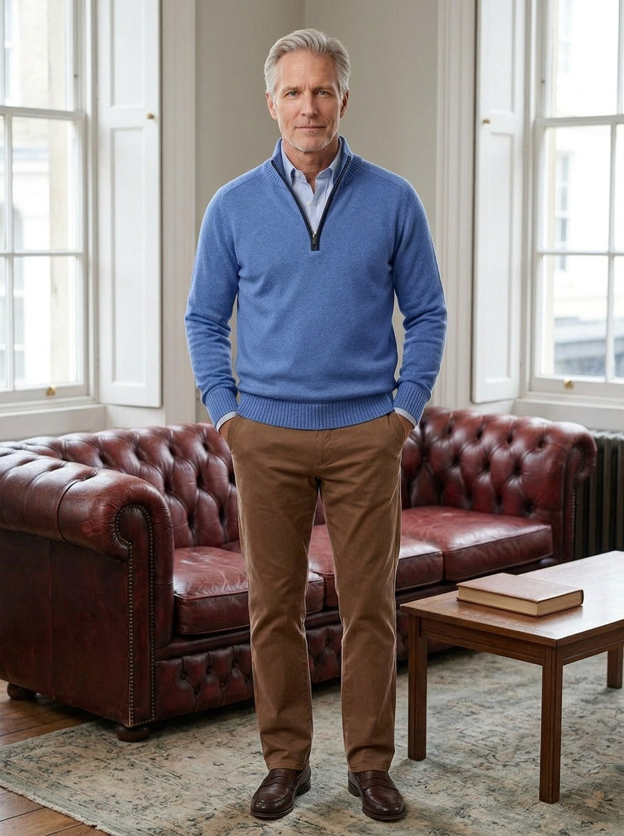 Hubbard quarter zip sweater in Blue, lifestyle in a club reading room, Gentlemens Manor