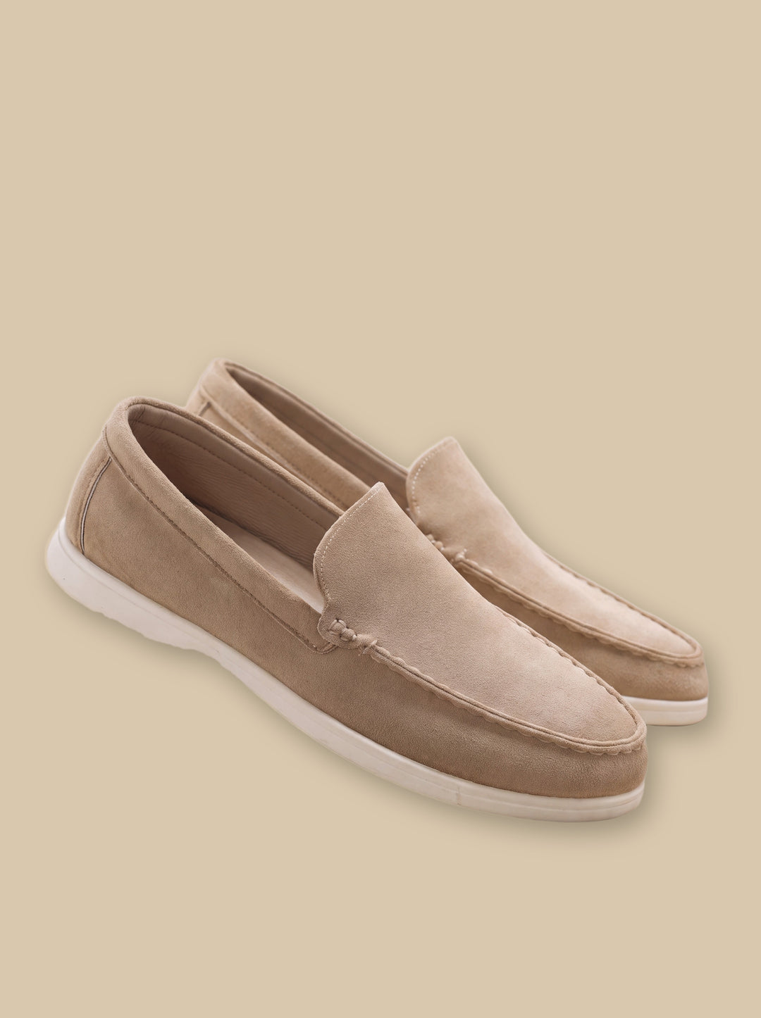 Hudson loafers in Beige, on a warm sand studio background - Gentlemens Manor