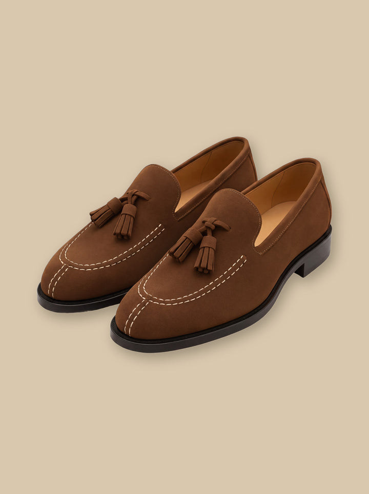 Hunter loafers in Brown, on a warm sand studio background - Gentlemens Manor