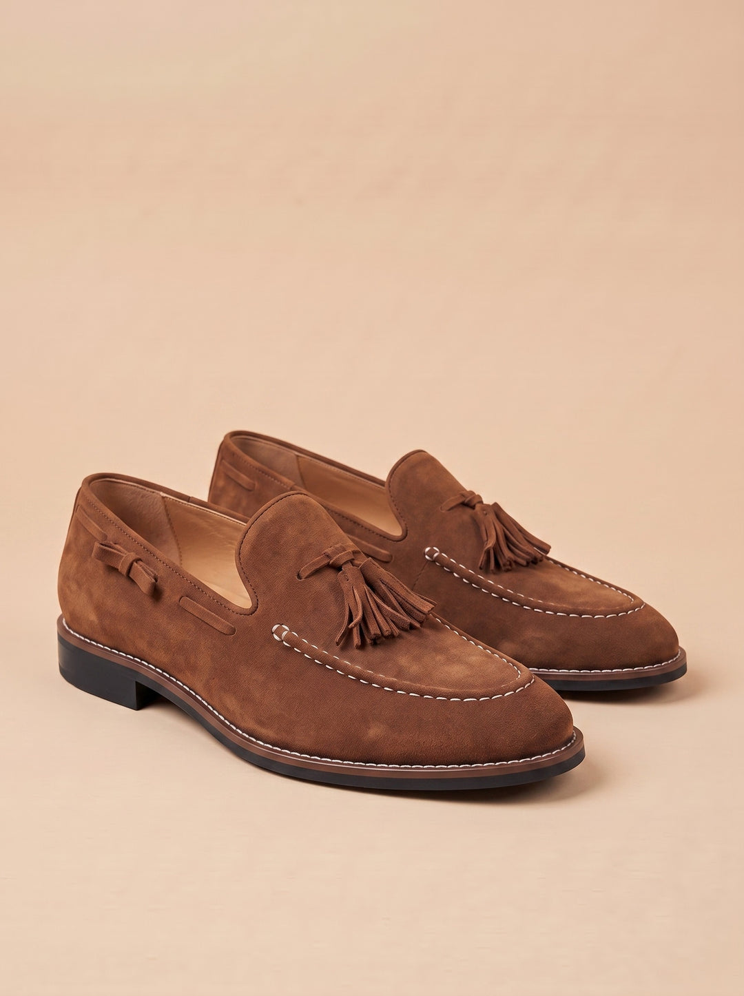 Hunter loafers in Brown, on a warm sand studio background - Gentlemens Manor