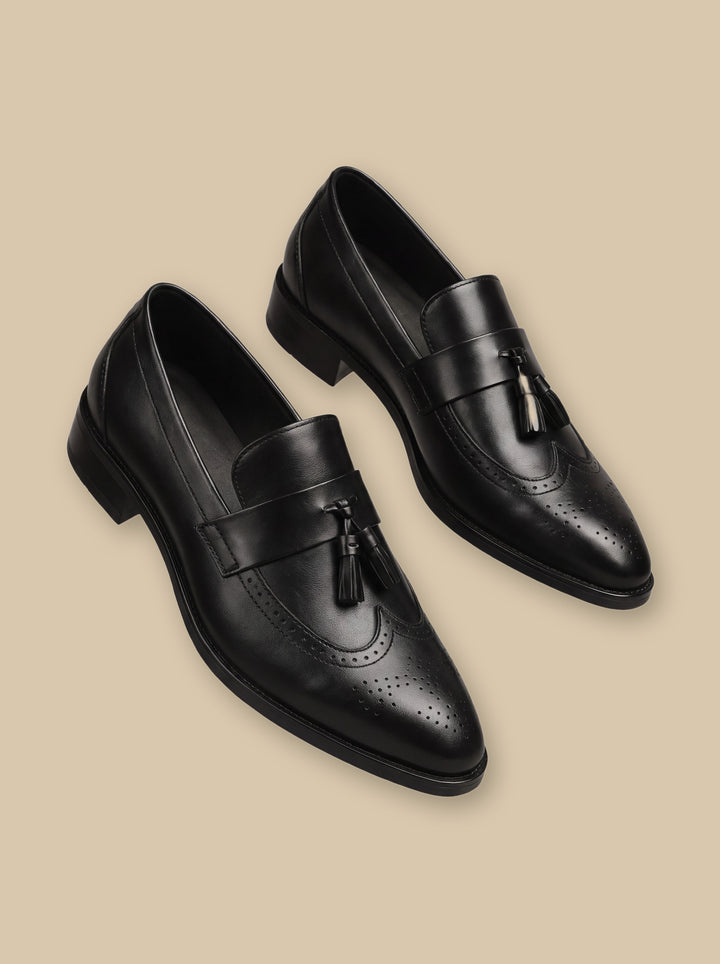 Isaac loafers in Black, on a warm sand studio background - Gentlemens Manor