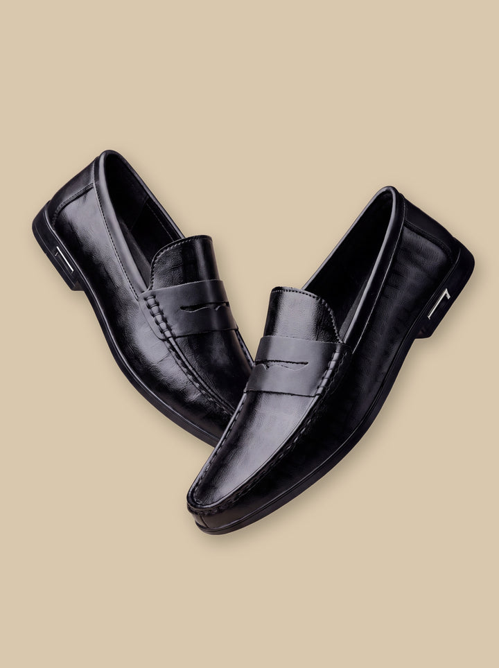Jerome loafers in Black, on a warm sand studio background - Gentlemens Manor