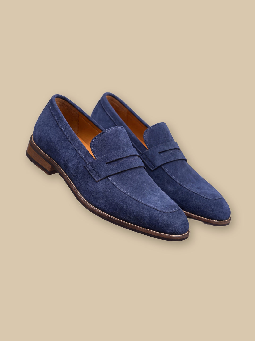 Jude loafers in Blue, on a warm sand studio background - Gentlemens Manor