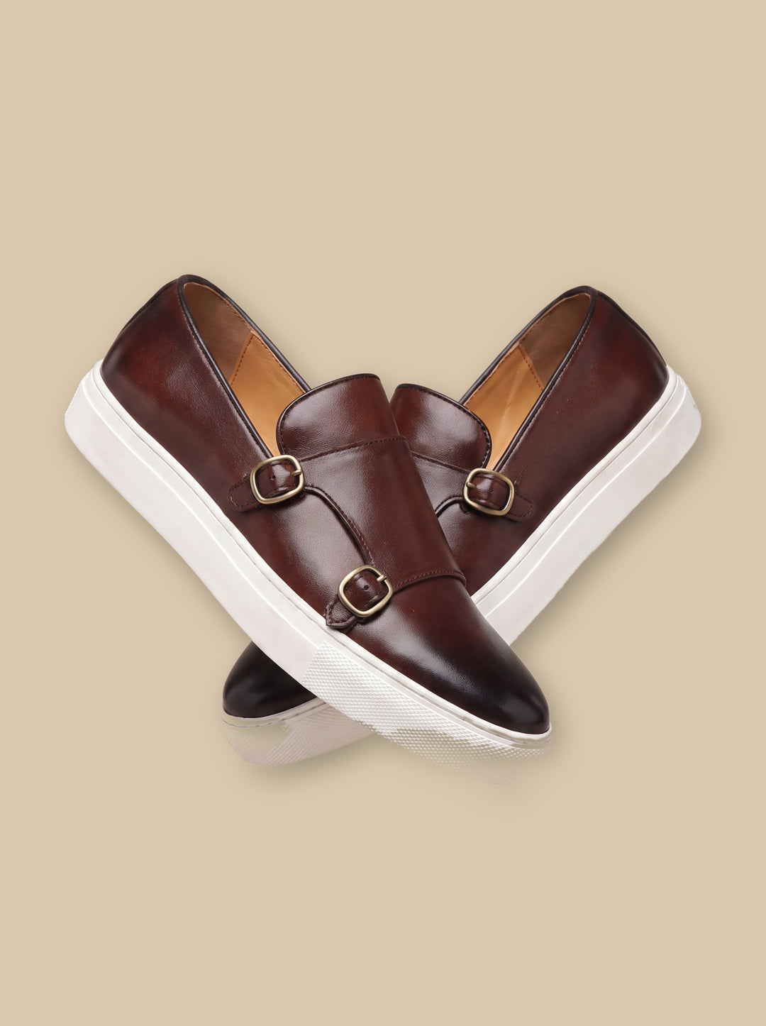 Julian loafers in Brown, on a warm sand studio background - Gentlemens Manor