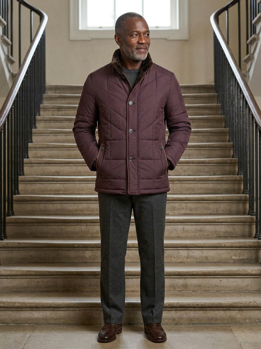 Kipling quilted winter jacket in Burgundy, lifestyle on a civic stone staircase, Gentlemens Manor