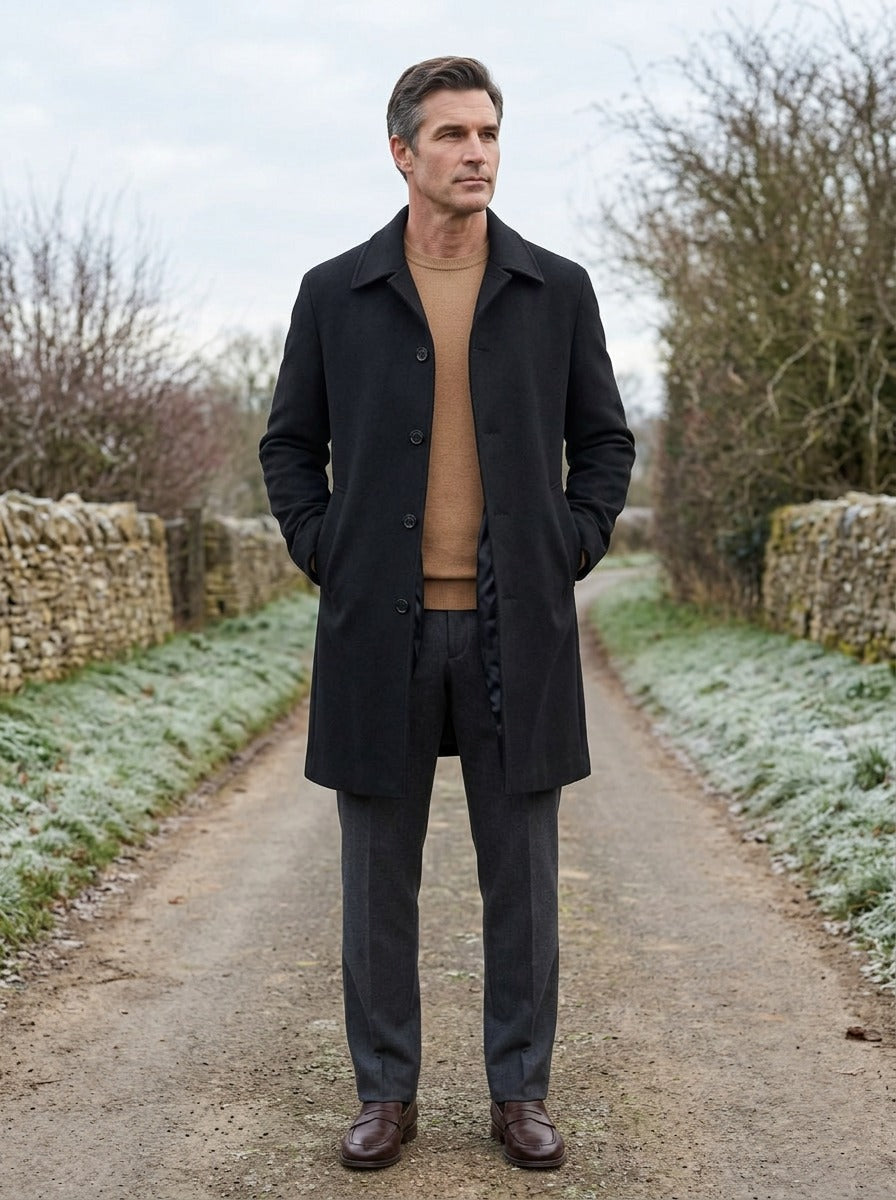 Lancaster point collar longline overcoat in Black, lifestyle on a country lane, Gentlemens Manor