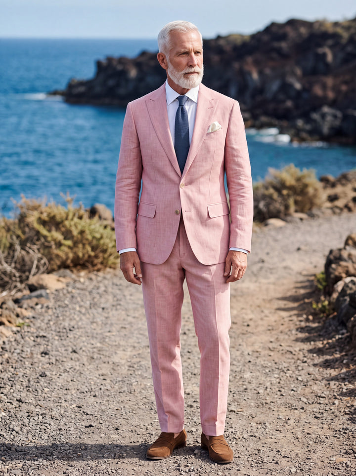 Langston Men two-piece suit in pink, worn by a model in a Mediterranean setting - Gentlemens Manor lifestyle
