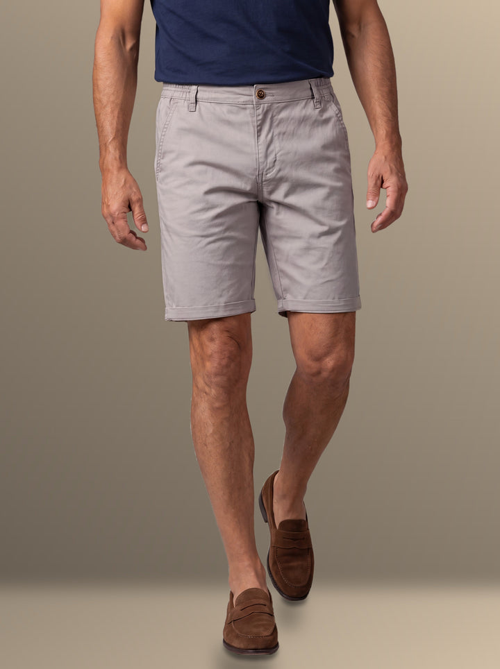 Leland summer shorts in Light Grey, worn by a model on a soft blue studio background - Gentlemens Manor