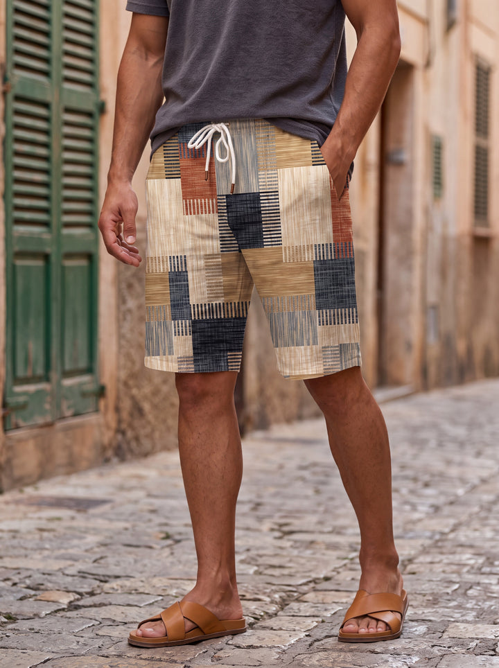 Lennox Men summer shorts in brown, worn by a model in a Mediterranean setting - Gentlemens Manor lifestyle
