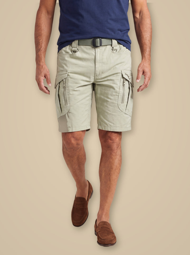 Leon summer shorts in Sand, worn by a model on a warm taupe studio background - Gentlemens Manor