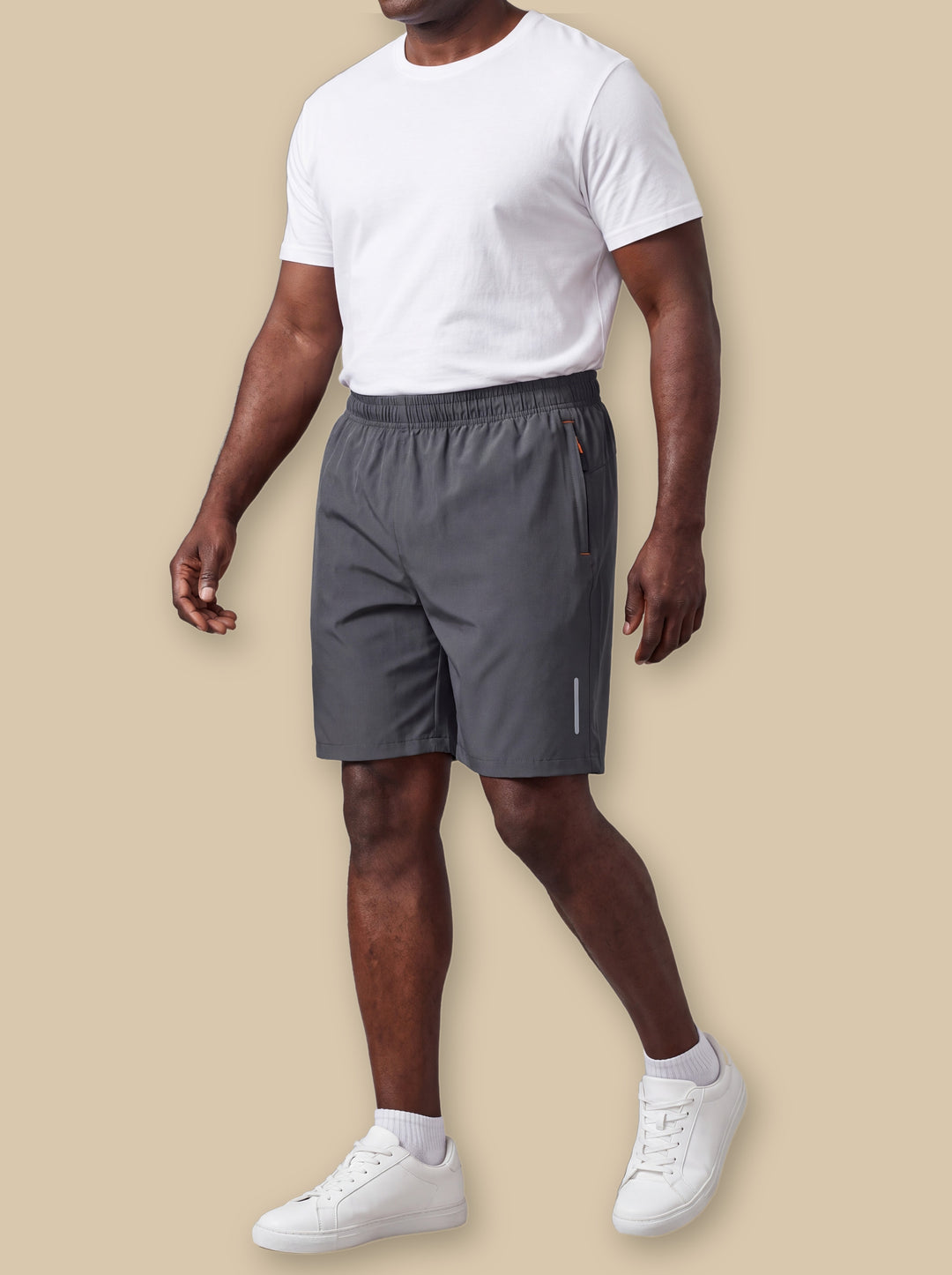 Leonard summer shorts in Charcoal, worn by a model on a warm sand studio background - Gentlemens Manor