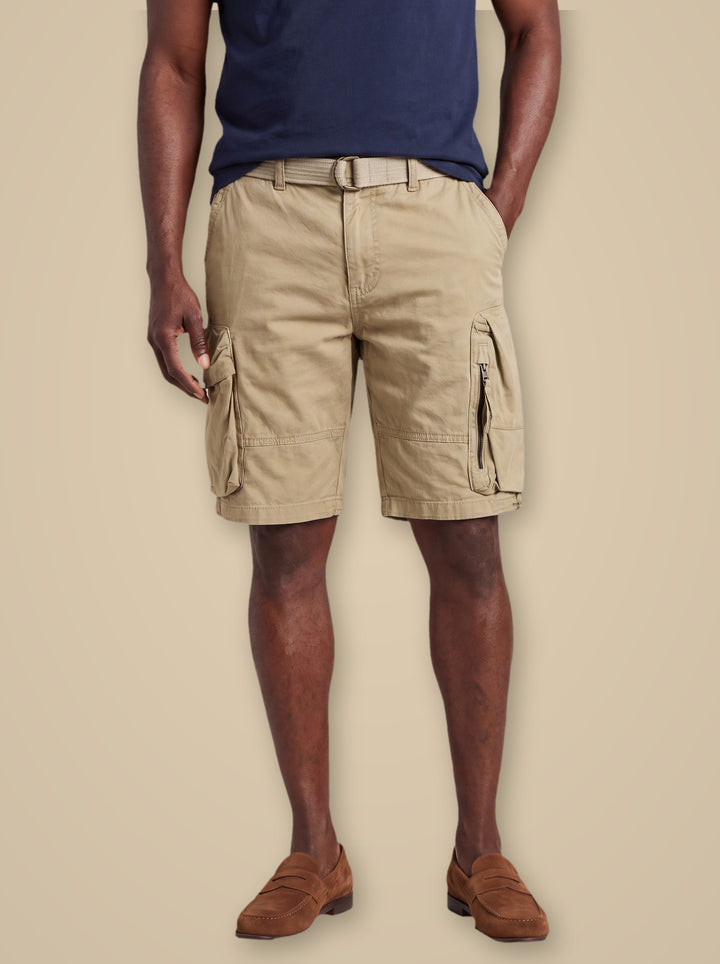Louis summer shorts in Sand, worn by a model on a warm taupe studio background - Gentlemens Manor