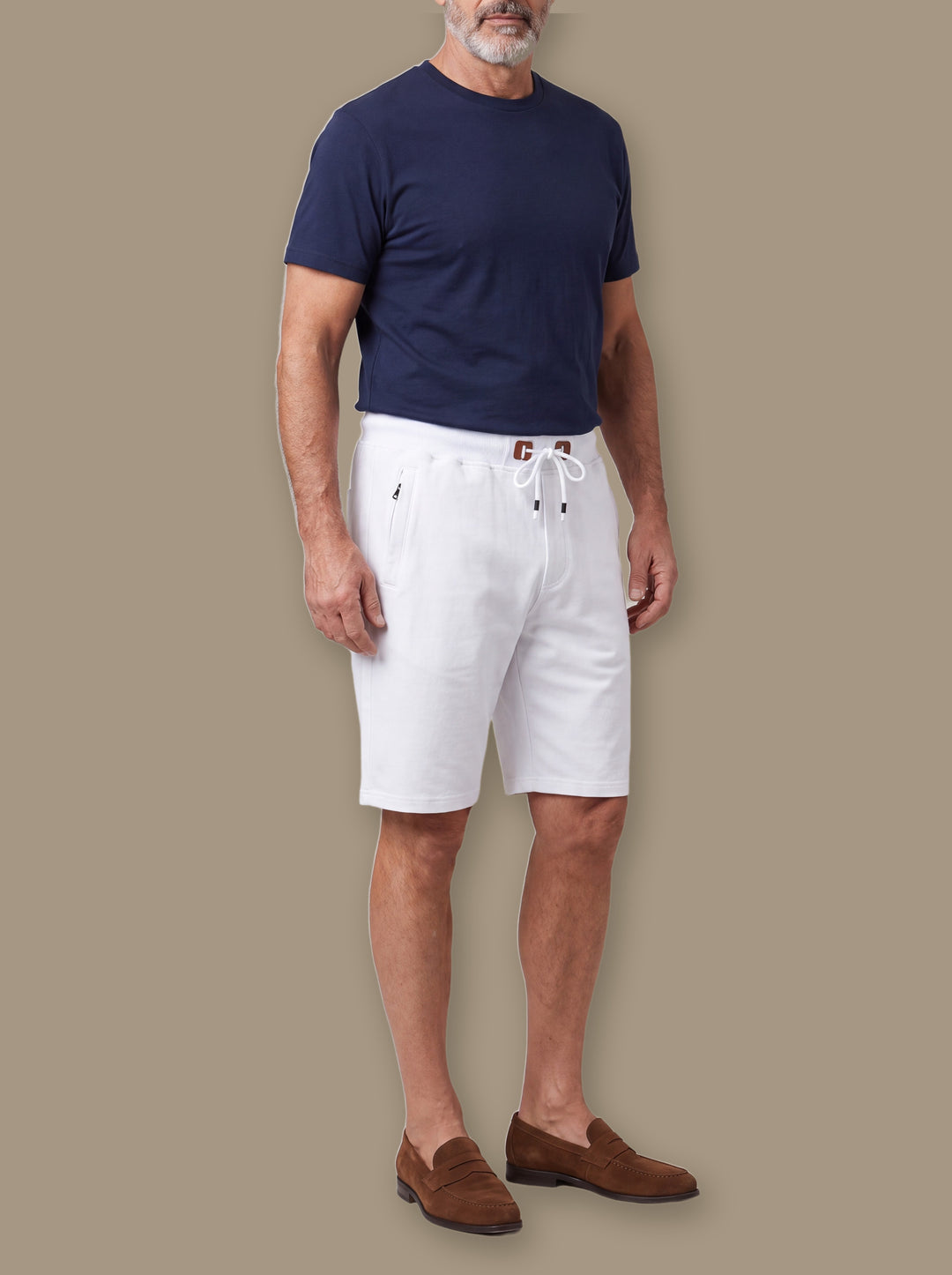 Lucas summer shorts in White, worn by a model on a warm taupe studio background - Gentlemens Manor