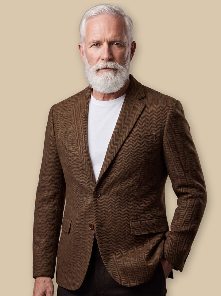 Lyndon blazer suit in Dark Brown, worn by a model on a warm sand studio background - Gentlemens Manor