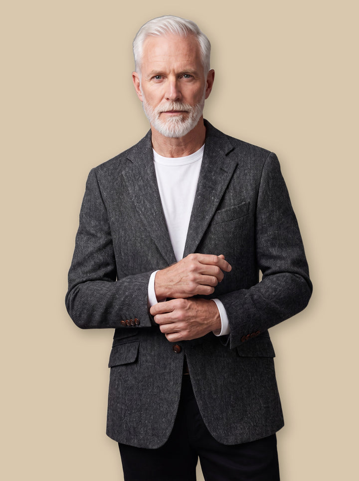 Mack blazer suit in Charcoal, worn by a model on a warm sand studio background - Gentlemens Manor