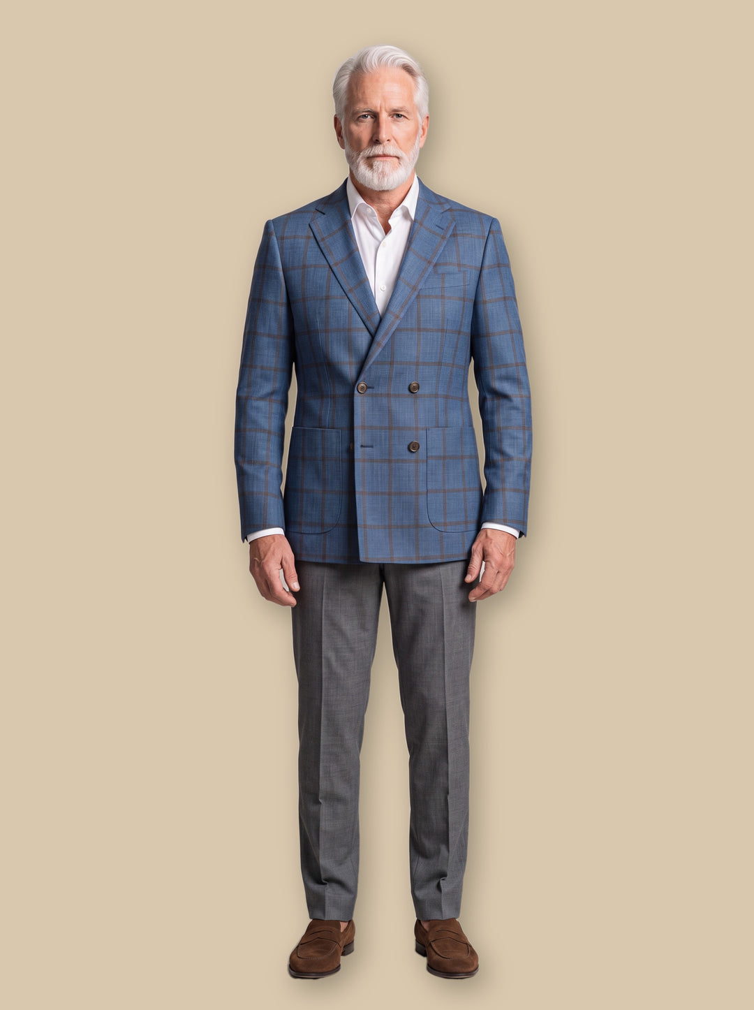 Magnus blazer in Blue, worn by a model on a warm sand studio background - Gentlemens Manor