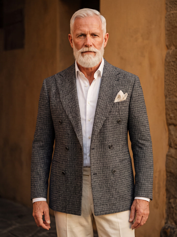 Magnus blazer in Grey, worn by a model in a Mediterranean setting - Gentlemens Manor lifestyle