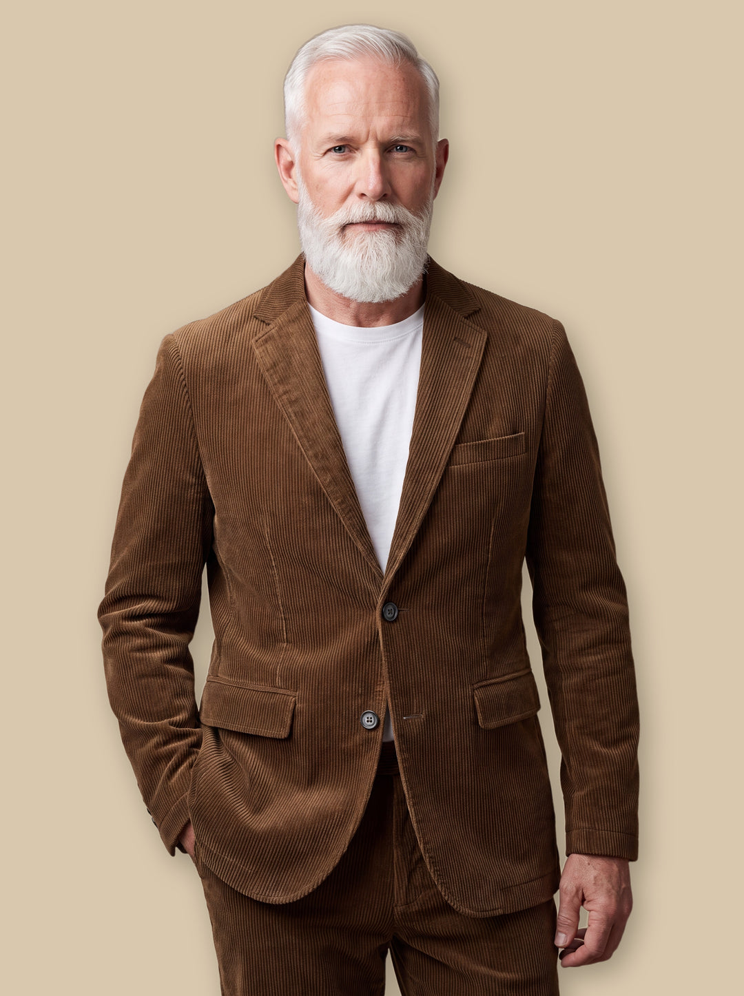 Malachi blazer suit in Brown, worn by a model on a warm sand studio background - Gentlemens Manor