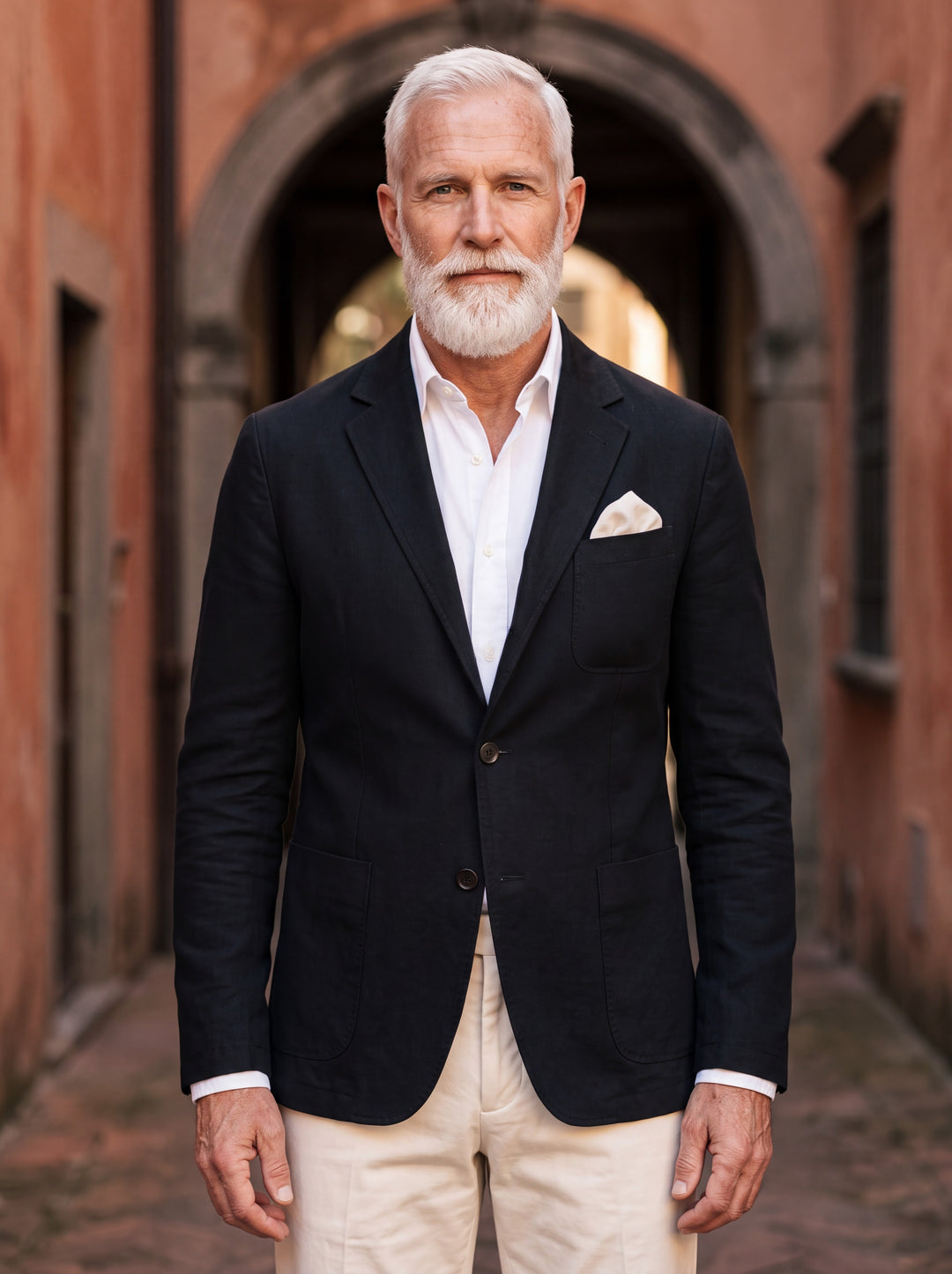 Marcus blazer in Black, worn by a model in a Mediterranean setting - Gentlemens Manor lifestyle