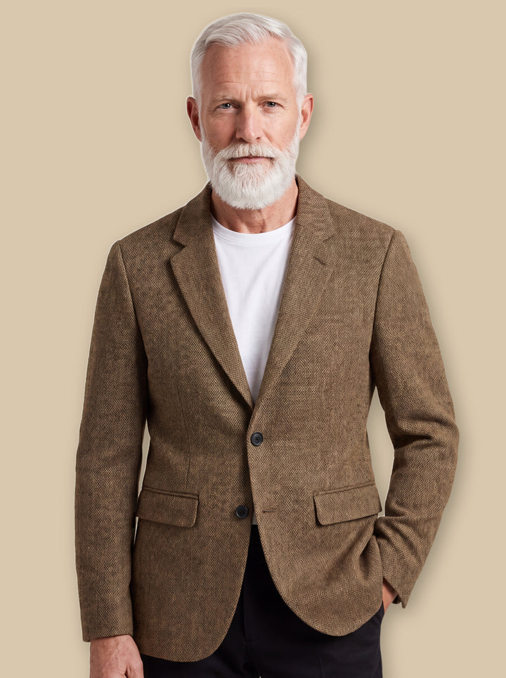 Marlon blazer suit in Brown, worn by a model on a warm sand studio background - Gentlemens Manor