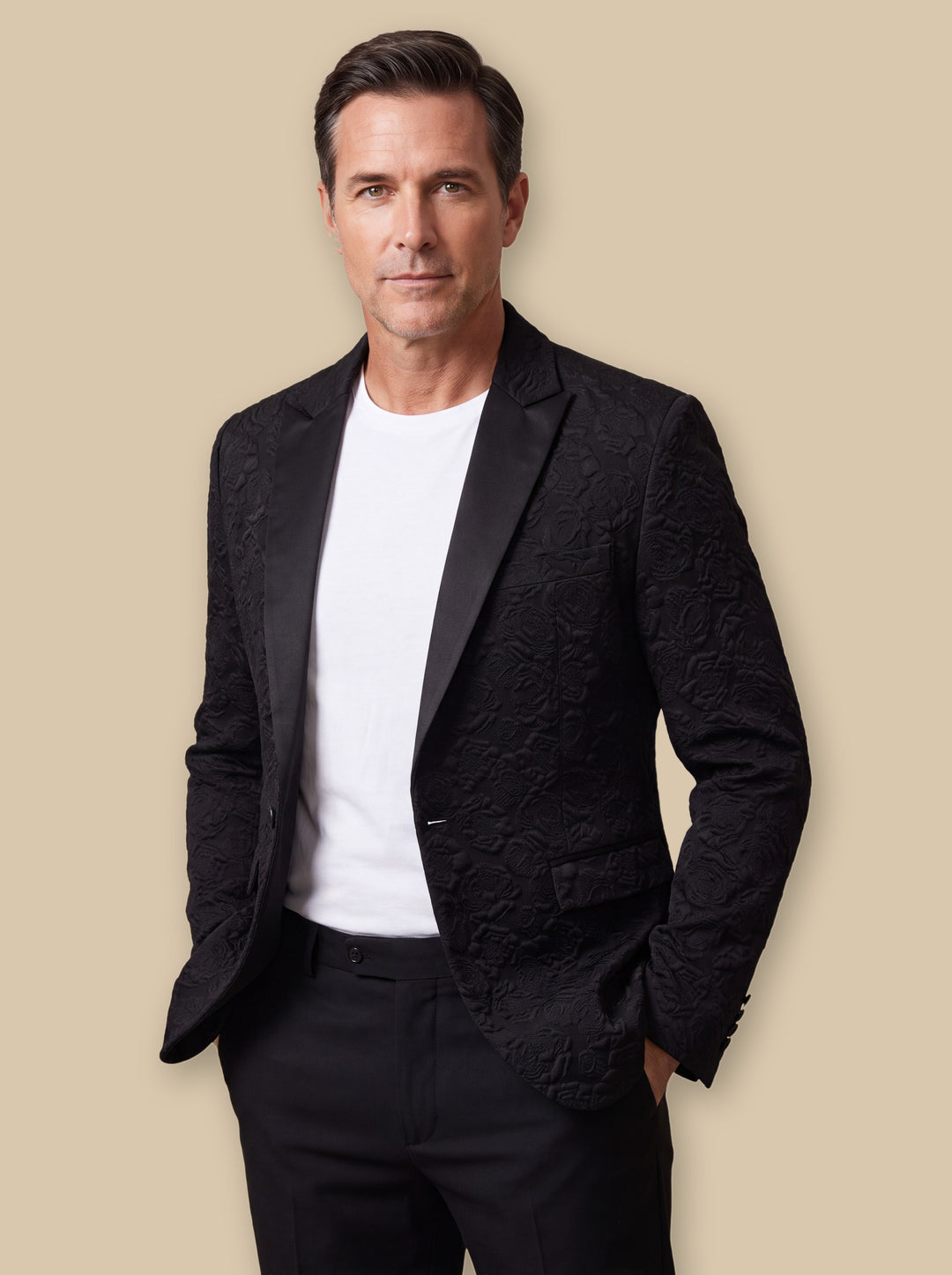 Marshall blazer suit in Black, worn by a model on a warm sand studio background - Gentlemens Manor