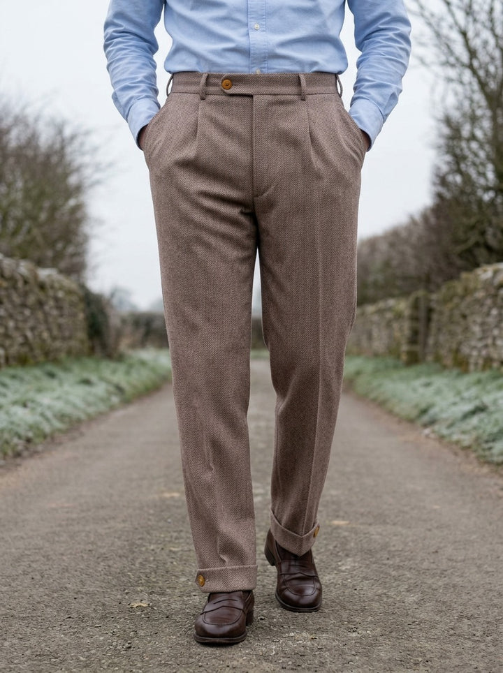 Marston herringbone buttoned cuff trousers in Brown, lifestyle on a country lane, Gentlemens Manor