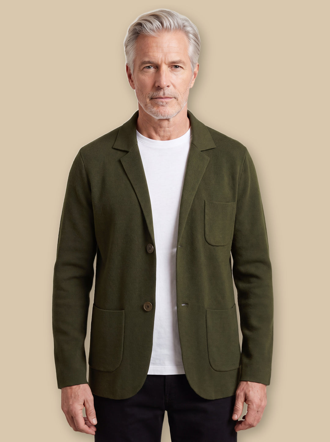 Martin blazer suit in Olive, worn by a model on a warm sand studio background - Gentlemens Manor
