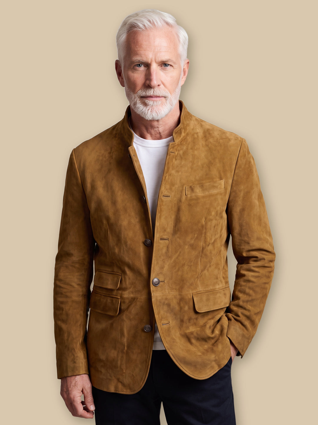 Marvin blazer suit in Sand, worn by a model on a warm sand studio background - Gentlemens Manor