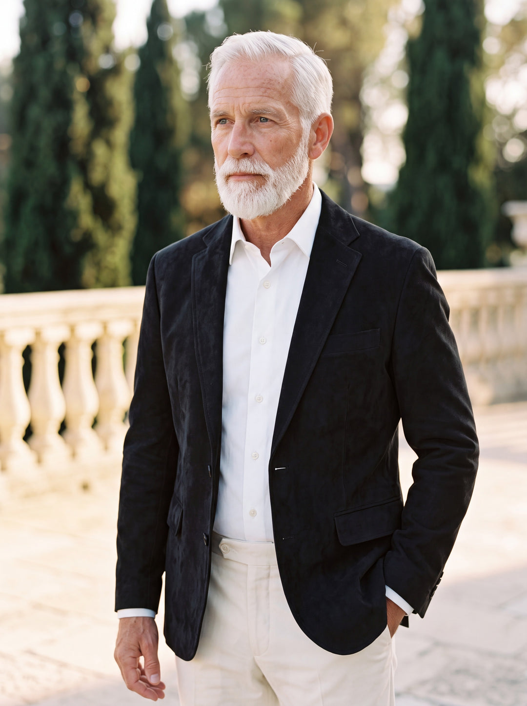 Mason blazer in Black, worn by a model in a Mediterranean setting - Gentlemens Manor lifestyle