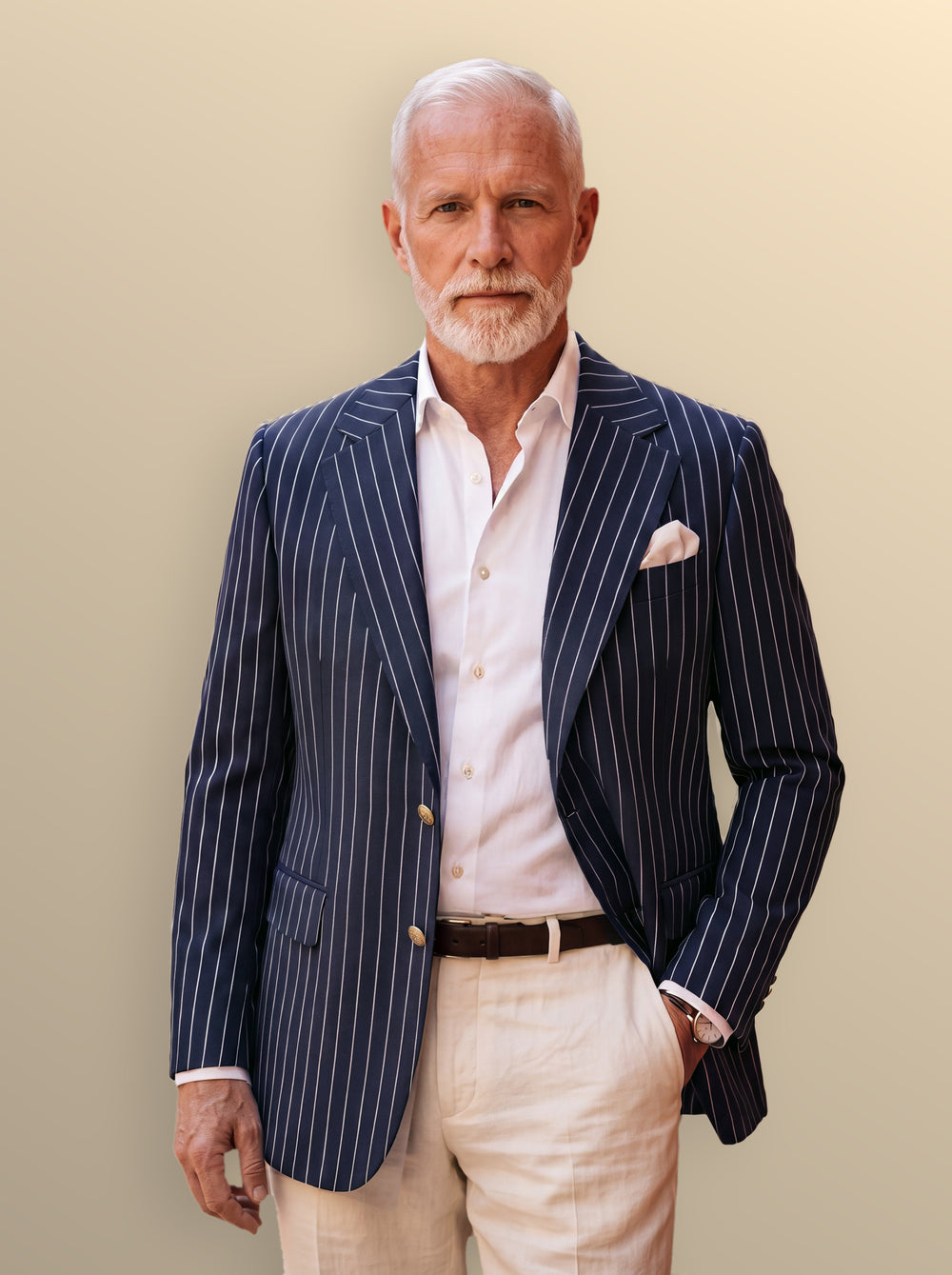Maurice pinstripe blazer in Navy, worn open over a white shirt in the studio, Gentlemens Manor