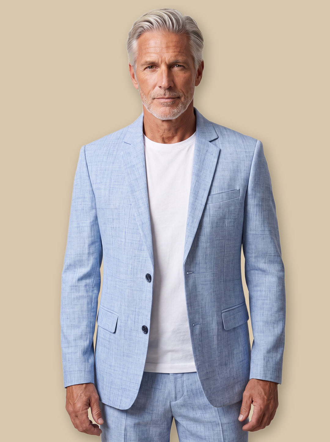 Maxwell blazer suit in Light Blue, worn by a model on a warm sand studio background - Gentlemens Manor