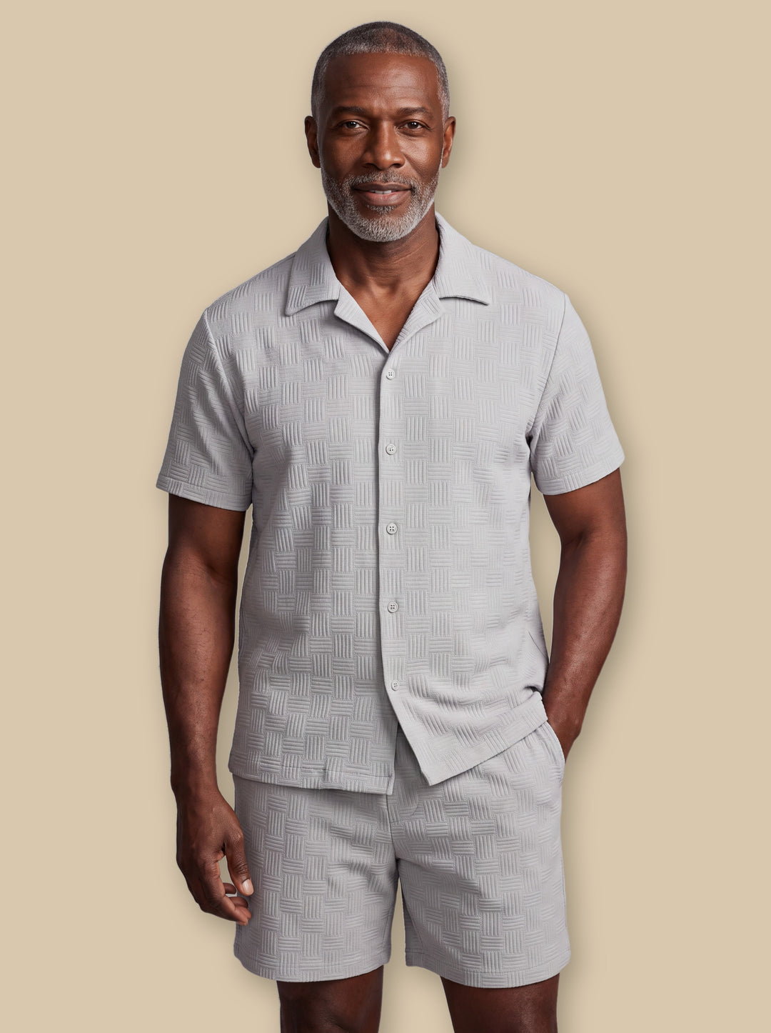 Maxwell two piece set in Grey, worn by a model on a warm sand studio background - Gentlemens Manor