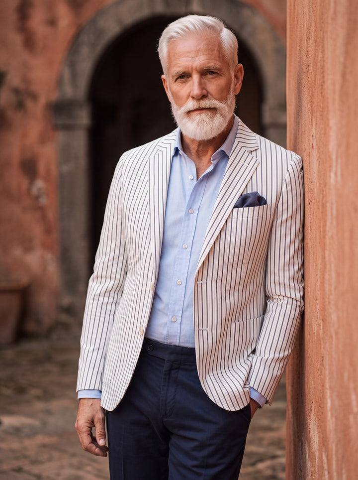 Maynard blazer in White, worn by a model in a Mediterranean setting - Gentlemens Manor lifestyle